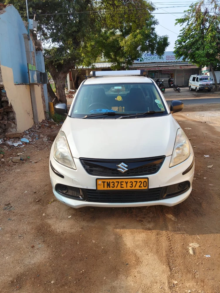 Madhuvarshika Cab Service’s actual white commercial sedan for Coimbatore and Tiruppur journeys